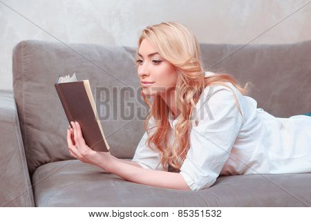 Beautiful young woman relaxing at home