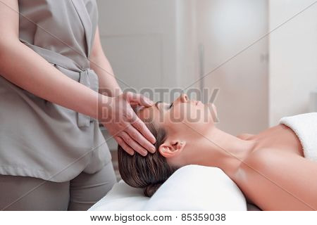 Beautiful young woman in spa
