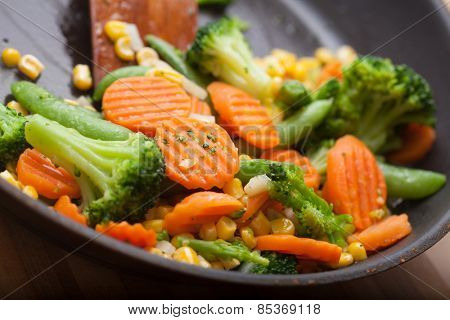 fresh vegetables on a frying pan, healthy breakfast