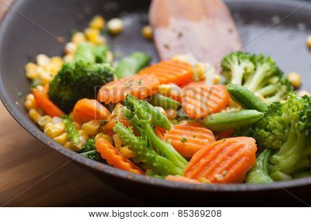 fresh vegetables on a frying pan, healthy breakfast