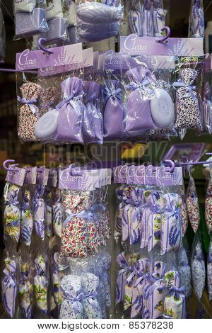 NICE, FRANCE - OCTOBER 2, 2014: Lavender sachets and soaps are sold as souvenirs on Rue Pairoliere, a quaint pedestrian shopping street in old Nice.