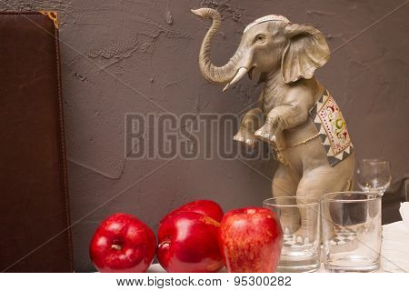 Figurine of an elephant on the background wall