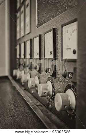 Instrument Panel With Circuit Breakers And Switches. Sepia