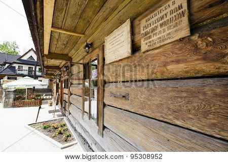 Facade Made Of Wooden Logs