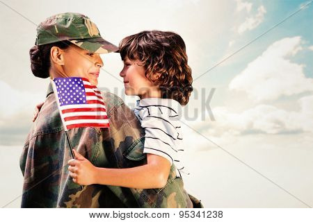Solider reunited with son against blue sky