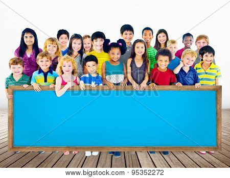 Multi-Ethnic Group of Children Holding Empty Billboard Concept