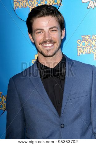 BURBANK - JUNE 25: Grant Gustin arrives at the 41st Annual Saturn Awards on Thursday, June 25, 2015 at the Castaway Restaurant in Burbank, CA.
