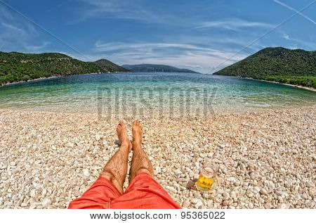 Paradise Relax with pint of beer at Antisamos Beach in Kefalonia, Greece