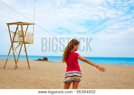 Almeria Mojacar beach girl in Mediterranean sea of Spain