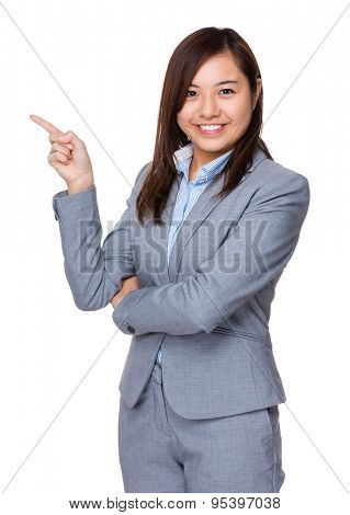 Businesswoman with finger pointing something