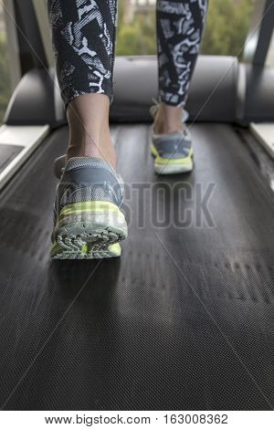Young Woman Goes In For Sports At Gym