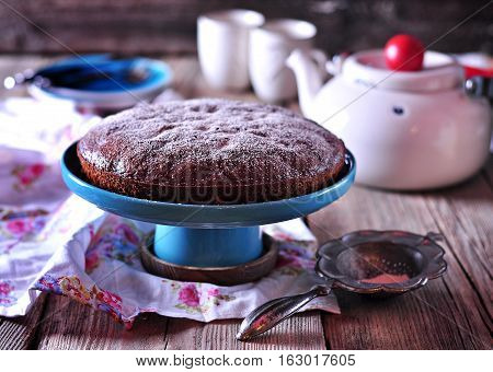 Lenten honey cake without eggs with raisins and nuts. Rustic style.