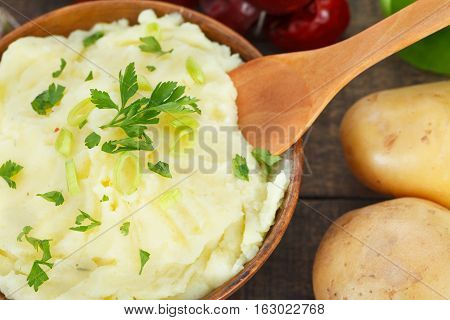 Mashed Potatoes with chopped green onion and parsley leaves