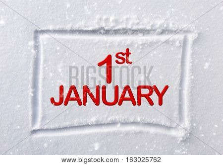 hand drawn square shape in the fresh snow with words 1st January