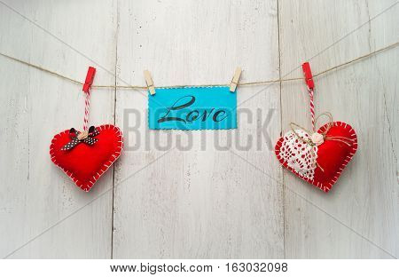 Beautiful Festive Heart Weigh On Cord On Wooden Background