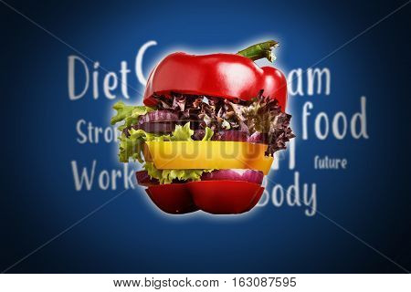 Healthy sandwich with fresh pepper, onion, salad lettuce on blue background. Detox diet and healthy lifestyle.