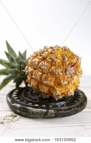 Ripe juicy fresh baby pineapple - ingredient for healthy food