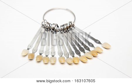 Close view of tooth color guide on a white background