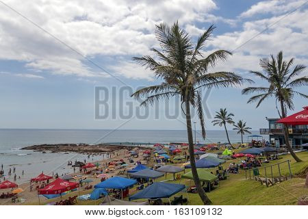 People On Early Morning Beach At Scottburgh In  South Africa