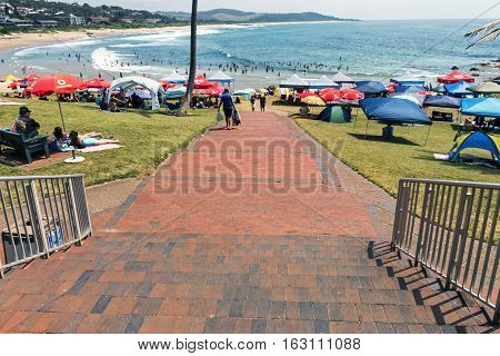 People On Early Morning Beach At Scottburgh In  South Africa