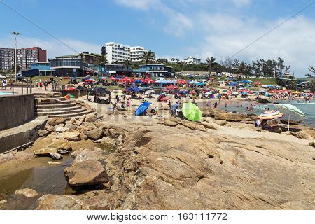 People On Early Morning Beach At Scottburgh In  South Africa