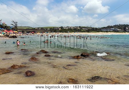 People On Early Morning Beach At Scottburgh In  South Africa
