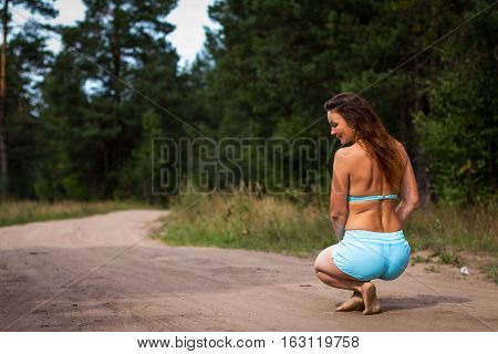 Girl In Bathing Suit In The Forest