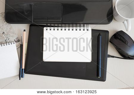 notebook for notes lying on the office desk