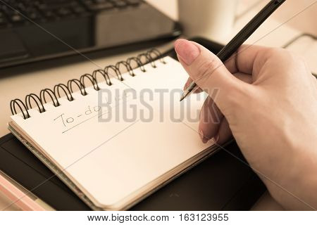 notebook for notes lying on the office desk