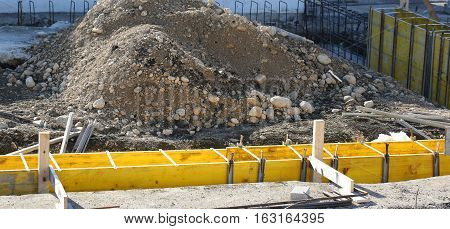 Pile Of Earth And Delimitation Of Outer Walls Of A House In Cons