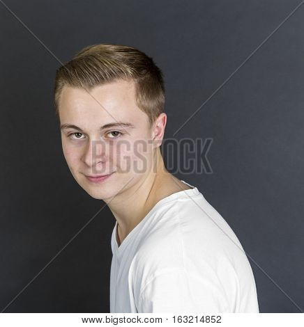 Portrait Of Cute Smiling Teenage Boy