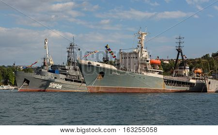 Sevastopol, Russia - June 09, 2016: Average sea tanker Koida and Rescue vessel Epron in the Bay of Black Sea.