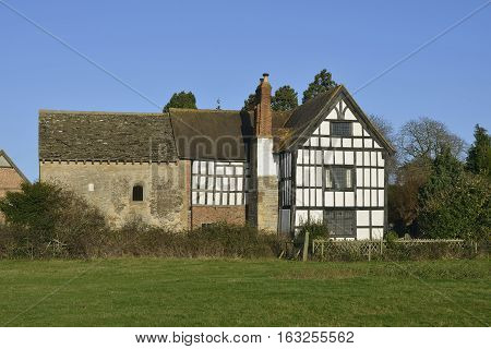9th century Odda's Chapel & 17th century Timber Framed Abbot's Court Deerhurst Gloucestershire