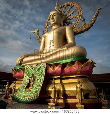 Big Buddha statue at Wat Phra Yai temple with blue sky in the morning on Koh Samui Suratthani Thailand