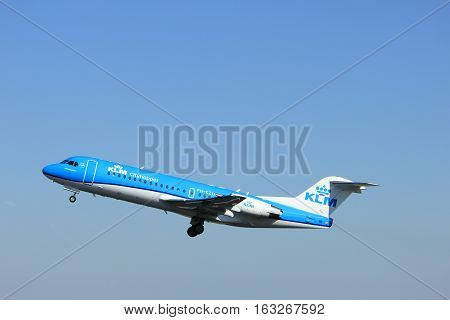Amsterdam the Netherlands - August 18th 2016: PH-KZU KLM Cityhopper Fokker F70 taking off from Polderbaan Runway Amsterdam Airport Schiphol