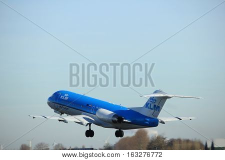 Amsterdam the Netherlands - November 25th 2016: PH-KZE KLM Cityhopper Fokker F70 taking off from Polderbaan Runway at Amsterdam Airport Schiphol