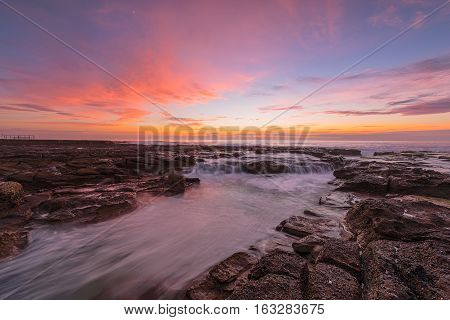 Sunrise on the Bar Beach in Newcastle NSW Australia.