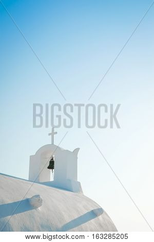 White church against blue sky in Santorini island Oia Greece