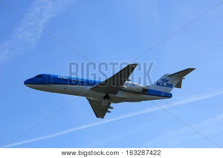 Amsterdam the Netherlands - November 25th 2016: PH-KZD KLM Cityhopper Fokker F70 taking off from Polderbaan Runway at Amsterdam Airport Schiphol