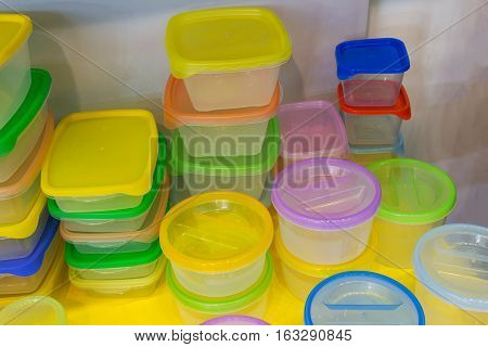 Reusable plastic container on the counter of the store