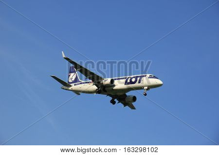 Amsterdam the Netherlands - May 6th 2016: SP-LII LOT - Polish Airlines Embraer ERJ approaching Schiphol Zwanenburg runway arriving from Warsaw Poland