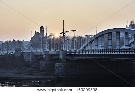 Bridge on the River Warta in Poznań at sunrise