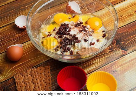 batter in the bowl before kneading with baking forms