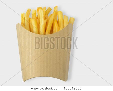 French fries in kraft blank paper box on white background. Clipping path included on white background.