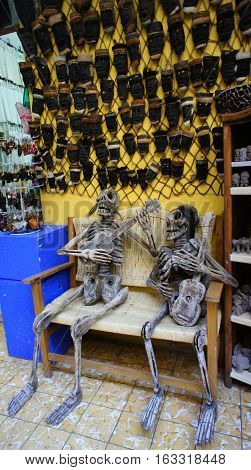 Decoration of human couple skeleton guitar player in souvenir store, Mexico. Mexican Dead festival and Halloween decoration.