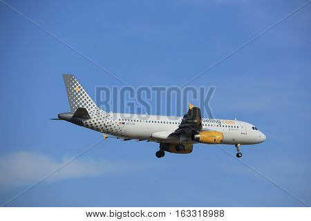 Amsterdam the Netherlands - July 21st 2016:EC-LUN Vueling Airbus A320 approaching Polderbaan runway at Schiphol Amsterdam Airport arriving from Naples