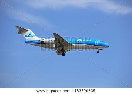 Amsterdam the Netherlands - July 21st 2016: PH-KZS KLM Cityhopper Fokker F70 approaching Polderbaan runway at Schiphol Amsterdam Airport arriving from Brussels Belgium