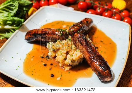 Cumberland sausage and mash served with fine gravy