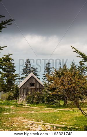 A rustic wooden cabin in the village at the to of Mount LeConte in the Smokies
