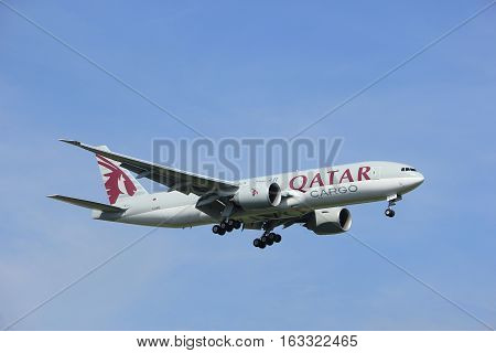Amsterdam the Netherlands - July 21st 2016:A7-BFE Qatar Airways Cargo Boeing 777 approaching Polderbaan runway at Schiphol Amsterdam Airport arriving from Chicago USA
